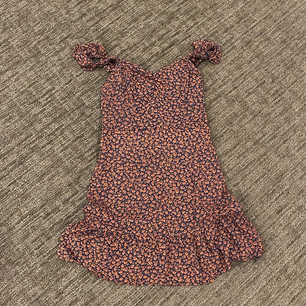 Sundress rust red color and navy blue size medium but I think it fits more small